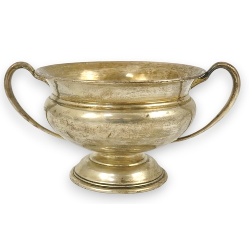 57 - A George V silver two handled pedestal bowl, by Charles Edwards, with scroll handles, London, 1911, ... 