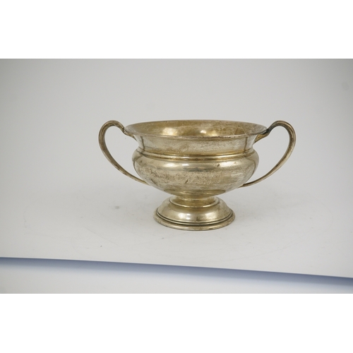 57 - A George V silver two handled pedestal bowl, by Charles Edwards, with scroll handles, London, 1911, ... 