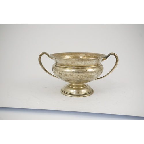 57 - A George V silver two handled pedestal bowl, by Charles Edwards, with scroll handles, London, 1911, ... 