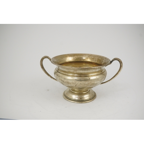 57 - A George V silver two handled pedestal bowl, by Charles Edwards, with scroll handles, London, 1911, ... 