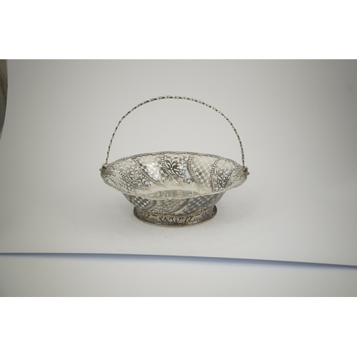 6 - A late George II pierced silver cake basket, by William Plummer?, of shaped circular form, with engr... 