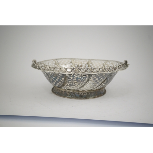 6 - A late George II pierced silver cake basket, by William Plummer?, of shaped circular form, with engr... 