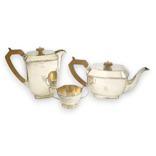 61 - A George V Scottish silver teapot and hot water pot, by Henry Tatton & Son, Edinburgh, 1934, togethe... 