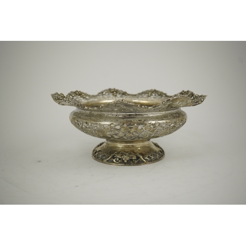 66 - A George V pierced silver circular pedestal bowl, by Mappin & Webb, with scroll decoration and fruit... 