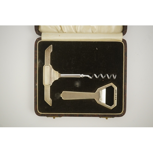 69 - A cased 1930's Art Deco silver corkscrew and bottle opener set, by G.W. Lewis & Co, Birmingham, 1933... 