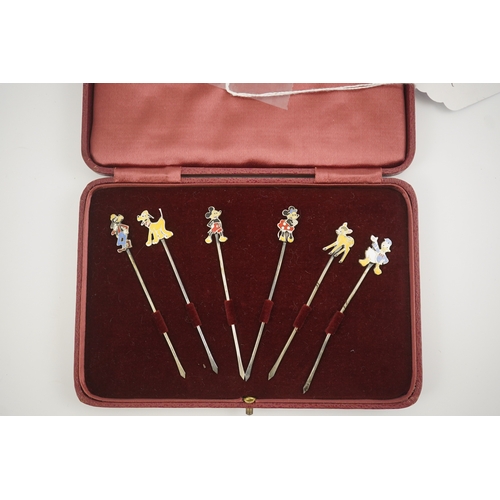 70 - A cased set of six enamelled sterling Disney Character cocktail sticks, including Mickey Mouse, Dona... 