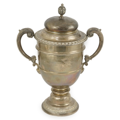 71 - A George V silver two handled presentation trophy cup and cover by Hunt & Roskell Ltd (late Storr & ... 