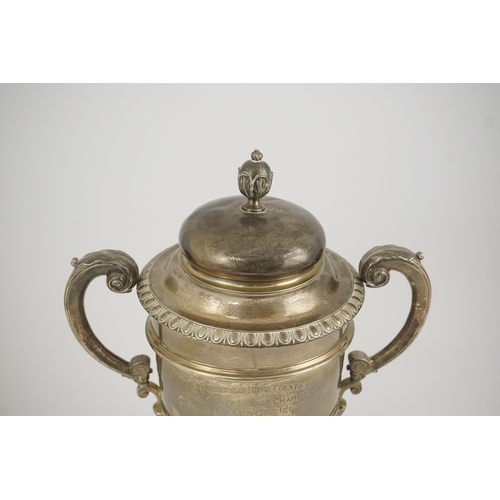 71 - A George V silver two handled presentation trophy cup and cover by Hunt & Roskell Ltd (late Storr & ... 