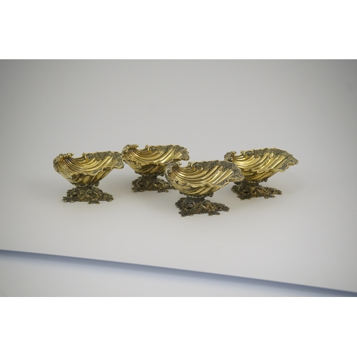 76 - A set of Elizabeth II Victorian style silver gilt pedestal shell salts, by Asprey & Co Ltd, London, ... 