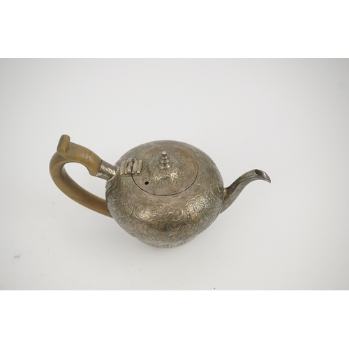 8 - An 18th century Irish silver inverted pyriform bachelor's teapot, maker E.R, embossed with shell, ge... 