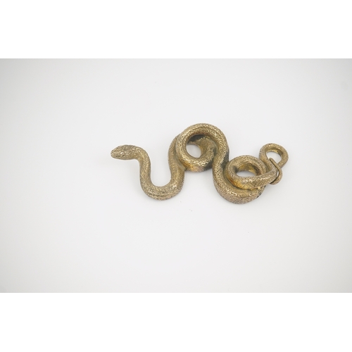 81 - A Sterling silver gilt model of a snake, stamped PR.S, 13.2cm, 10.8oz.