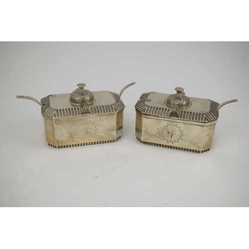 82 - A pair of Elizabeth II silver double lidded condiments and matching spoons, by Hennell, Frazer & Haw... 