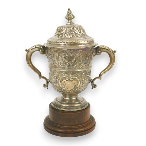 9 - A George II silver loving cup with later floral embossed decoration, maker's initials RI, London, 17... 