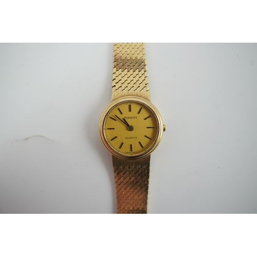 93 - A lady's early 1980's 9ct gold Tissot quartz wrist watch with textured 9ct gold associated bracelet,... 