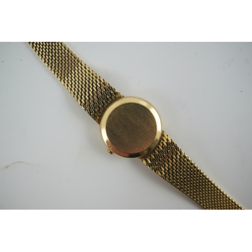 93 - A lady's early 1980's 9ct gold Tissot quartz wrist watch with textured 9ct gold associated bracelet,... 