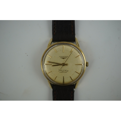 99 - A gentleman's 1960's? 9ct gold Longines Flagship automatic wrist watch, with baton numerals, case di... 