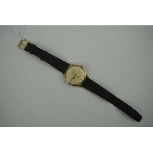 99 - A gentleman's 1960's? 9ct gold Longines Flagship automatic wrist watch, with baton numerals, case di... 