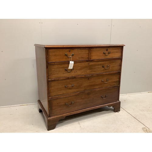 1003 - A George III mahogany chest of two short and three long drawers on bracket feet, width 114cm, depth ... 