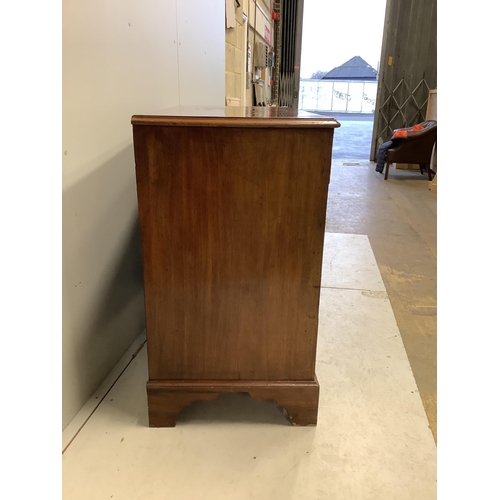 1003 - A George III mahogany chest of two short and three long drawers on bracket feet, width 114cm, depth ... 