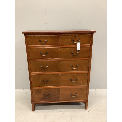 1009 - A George III style mahogany chest of two short and four long drawers, veneered fronts with brass loo... 