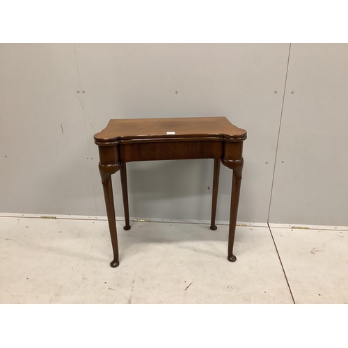 1010 - A George II style mahogany folding card table, width 75cm, depth 38cm, height 76cm. Condition - fair... 