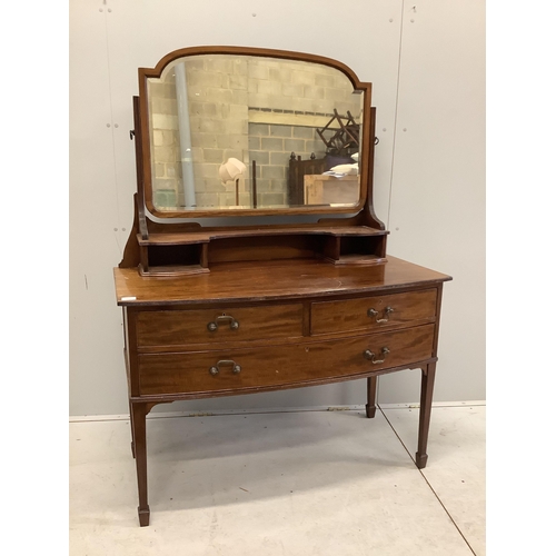 1019 - An early 20th century mahogany bowfront dressing table, fitted two short and one long drawer with br... 