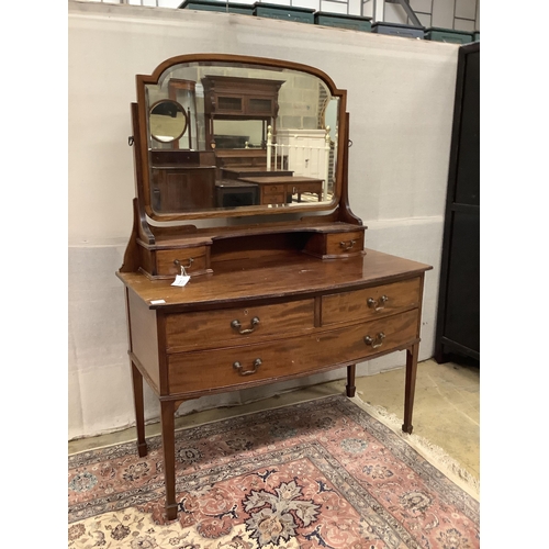 1019 - An early 20th century mahogany bowfront dressing table, fitted two short and one long drawer with br... 