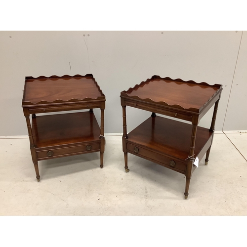 1026 - A pair of reproduction mahogany two tier tables fitted slides on ring turned legs, width 48cm, depth... 