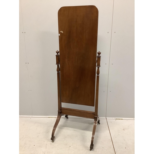 1035 - An early 20th century mahogany cheval mirror with moulded frame and reeded down swept legs, width 54... 