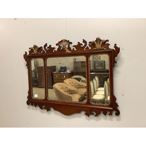 1036 - A George III style mahogany, parcel gilt triple plate fret cut wall mirror with Prince of Wales plum... 