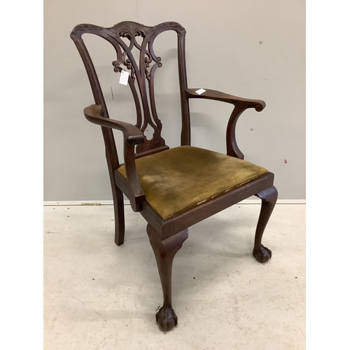 1041 - A George III Chippendale style mahogany elbow chair with a later similar elbow chair. Condition - fa... 