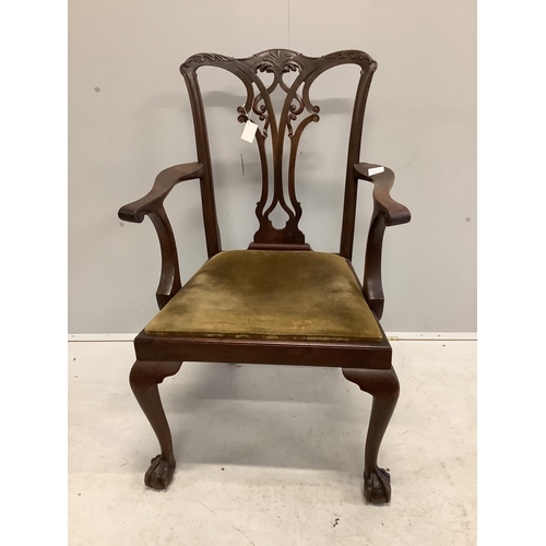 1041 - A George III Chippendale style mahogany elbow chair with a later similar elbow chair. Condition - fa... 