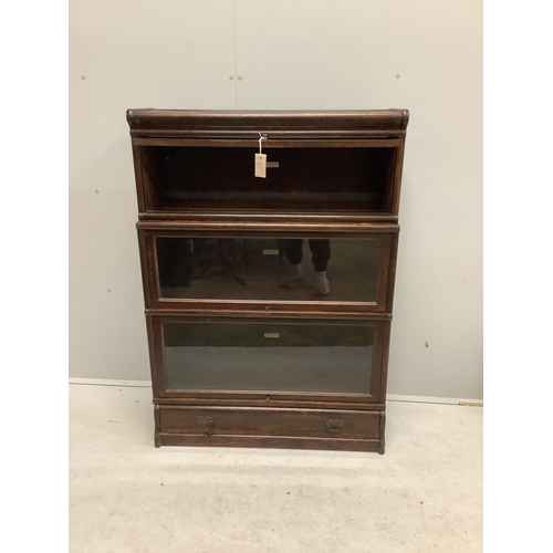 1048 - A Globe Wernicke oak three section bookcase, width 86cm, depth 33cm, height 122cm. Condition - fair... 