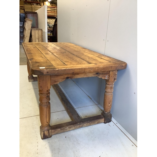 1080 - An 18th century style rectangular pine refectory table, width 180cm, depth 90cm, height 72cm. Condit... 