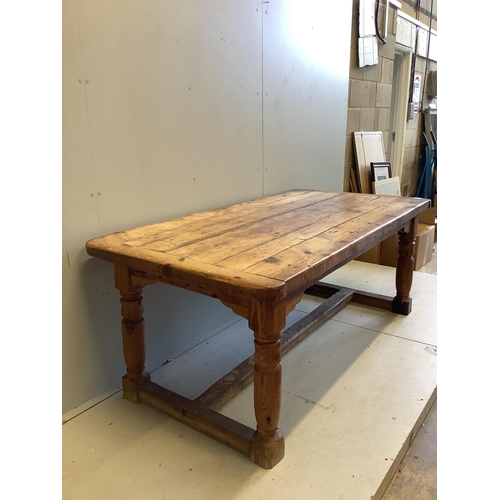 1080 - An 18th century style rectangular pine refectory table, width 180cm, depth 90cm, height 72cm. Condit... 