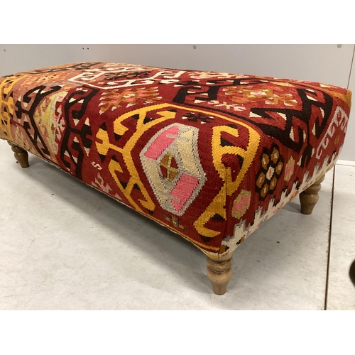 1081 - A large contemporary rectangular footstool with antique polychrome Kilim upholstery on turned beech ... 