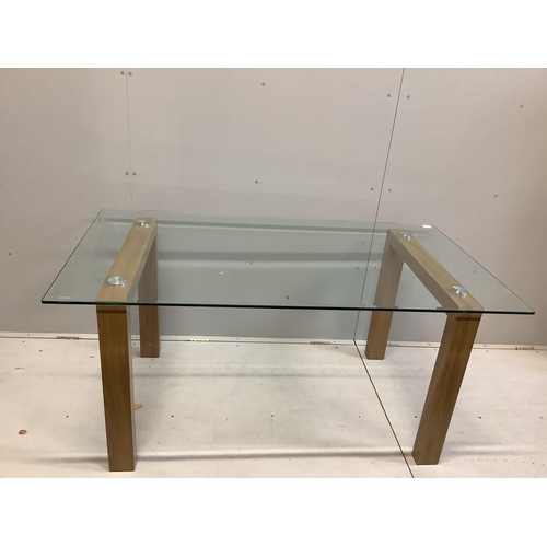 1111 - A Contemporary rectangular glass top dining table, width 160cm, depth 90cm, height 75cm and six upho... 