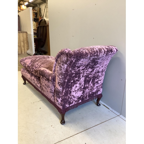 1112 - An early 20th century day bed, re-upholstered in contemporary buttoned purple fabric, width 160cm, d... 