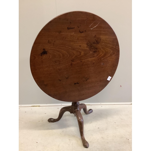 1114 - A George III circular mahogany tilt top tea table, diameter 78cm, height 71cm. Condition - fair... 