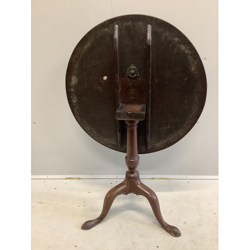 1114 - A George III circular mahogany tilt top tea table, diameter 78cm, height 71cm. Condition - fair... 