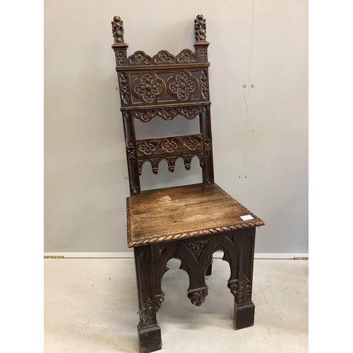 1121 - A pair of 19th century Italian walnut hall chairs, width 48cm, depth 39cm, height 118cm. Condition -... 