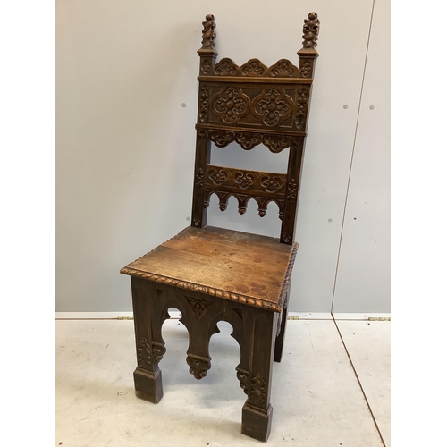 1121 - A pair of 19th century Italian walnut hall chairs, width 48cm, depth 39cm, height 118cm. Condition -... 