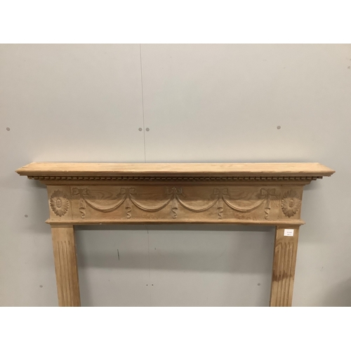 1132 - An Adam design pine fire surround, width 128cm, height 118cm. Condition - fair to good