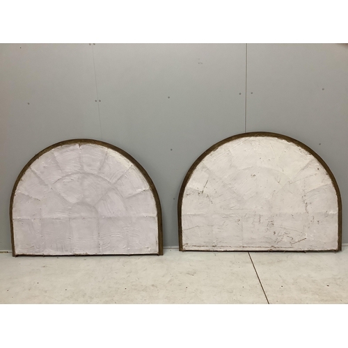 1136 - A pair of architectural cast iron window panel wall mirrors of domed form, width 136cm, height 102cm... 