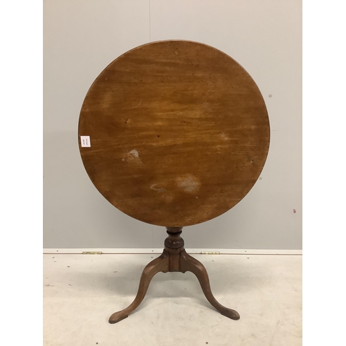 1141 - A George III circular mahogany tilt top tripod tea table, diameter 69cm, height 72cm. Condition - fa... 