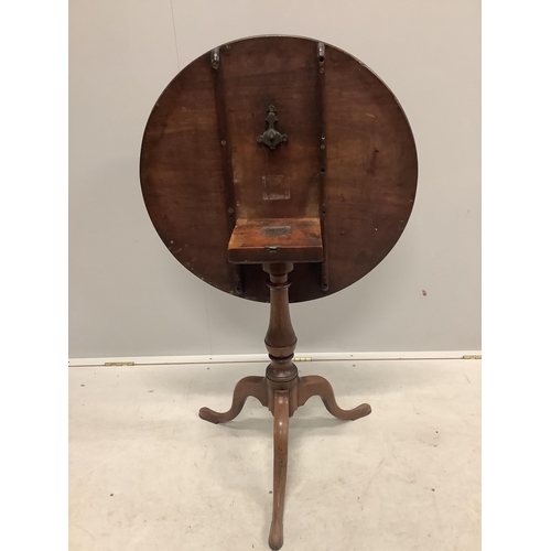 1141 - A George III circular mahogany tilt top tripod tea table, diameter 69cm, height 72cm. Condition - fa... 