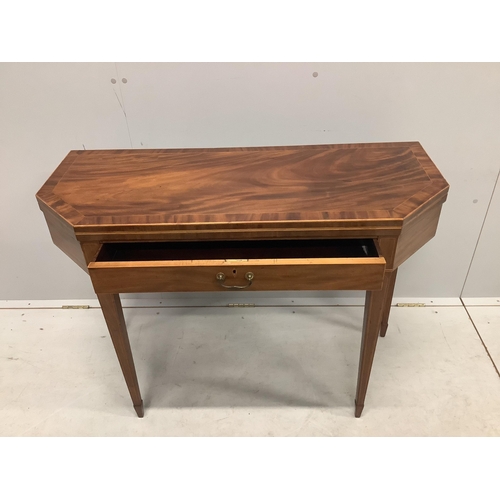 1143 - A George III mahogany folding tea table with frieze drawer, width 101cm, depth 41cm, height 73cm. Co... 