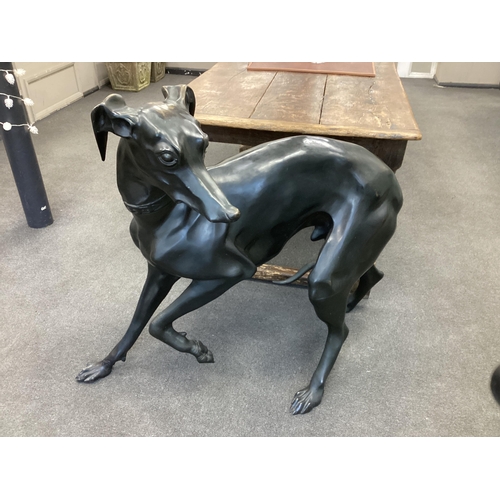 1162 - After P.J.Mene a life size dark patinated bronze of a standing greyhound, length 115cm, height 97cm.... 