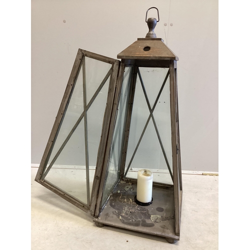 1164 - A large contemporary glazed pine interior candle lantern, height 86cm. Condition - good.