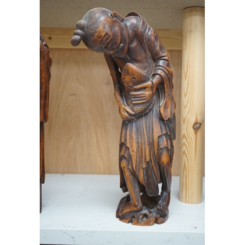 1254 - Two 19th century Chinese bamboo root figures of a fisherman and Shou Lao, tallest 32cm. Condition - ... 